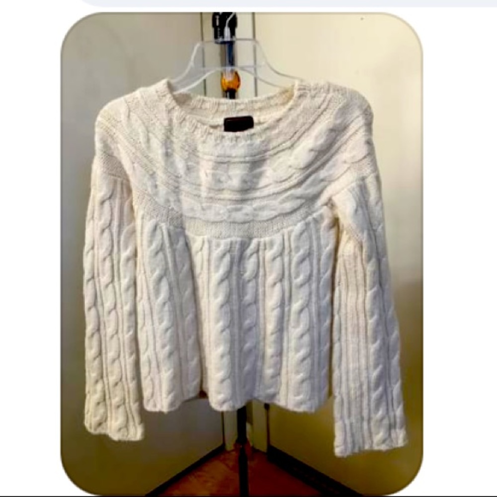 Even design history wool sweater